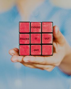 hand holding rubiks cube