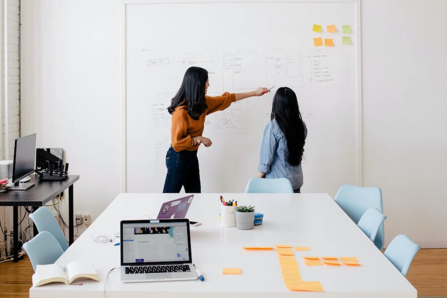 two-women-in-workplace-planning