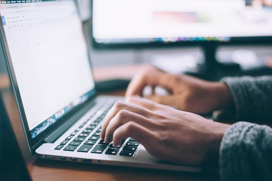 woman looking at laptop