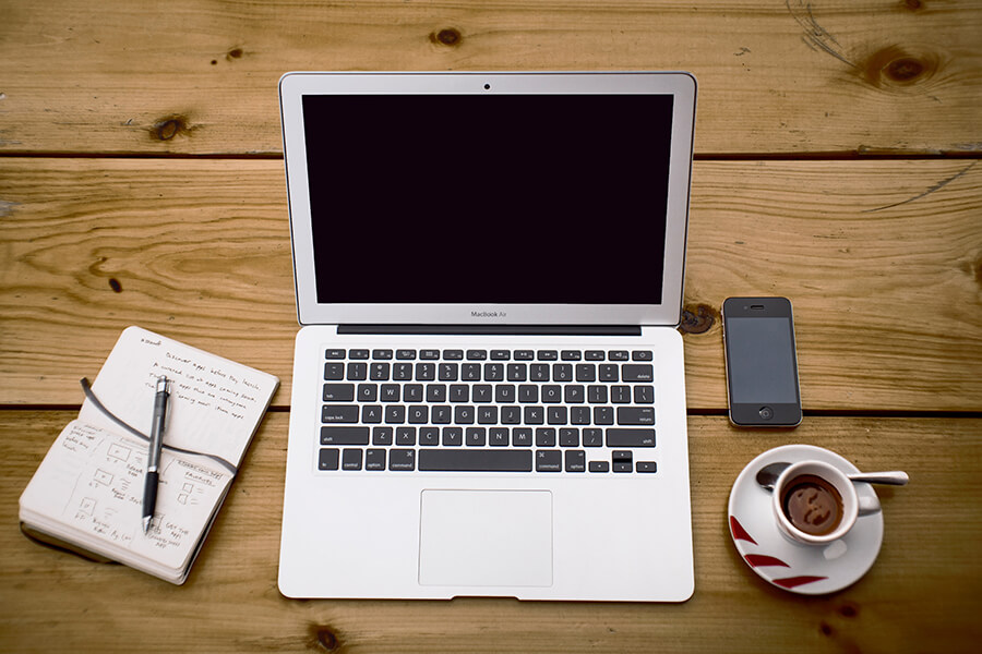 woman looking at laptop